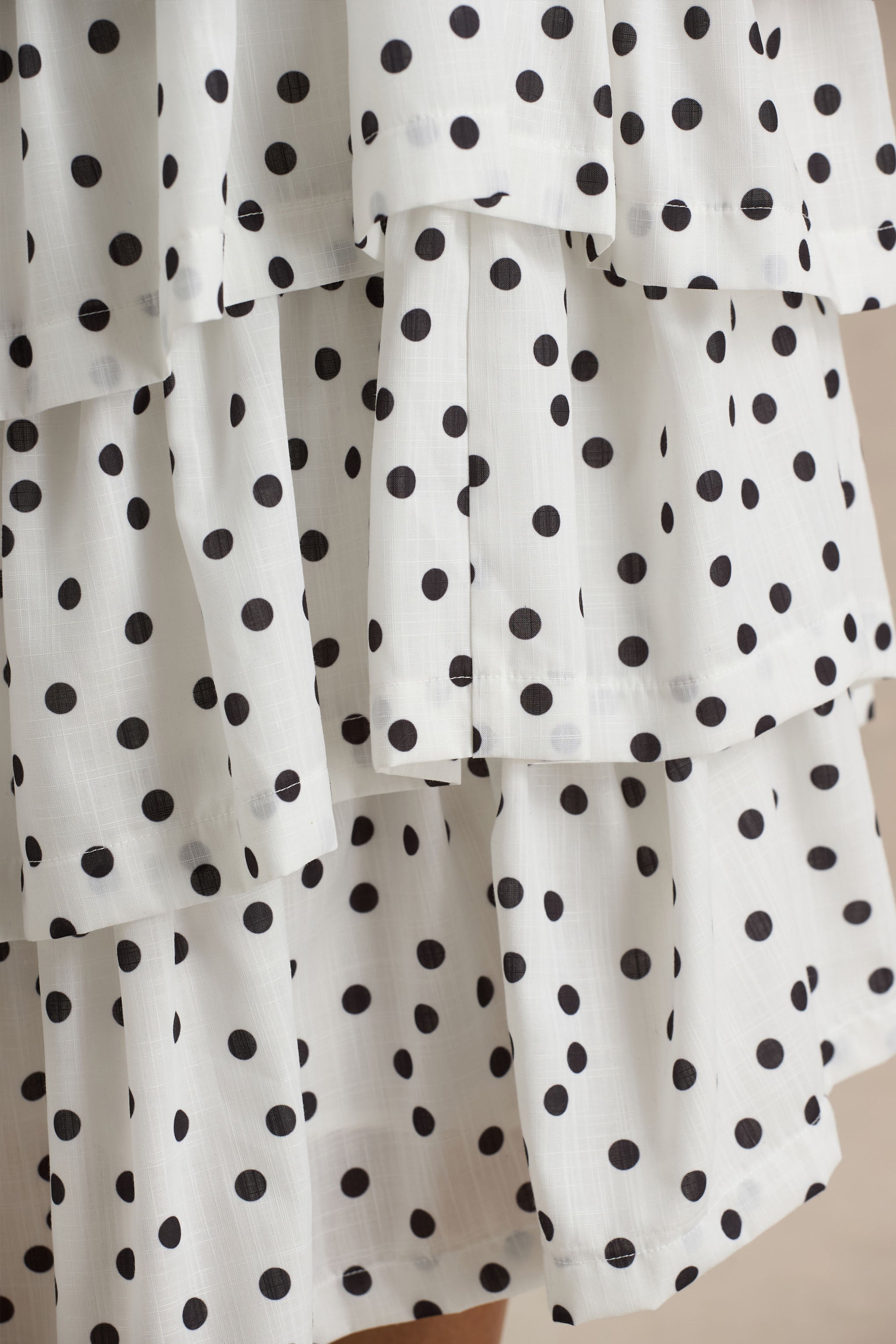 Violet | White Polka Dot Linen Midi Dress With Halter-Neck and Ruffled Skirt